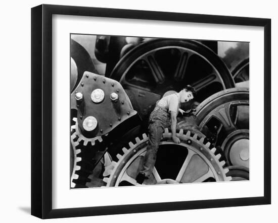 Charlie Chaplin. "The Masses" 1936, "Modern Times" Directed by Charles Chaplin-null-Framed Photographic Print