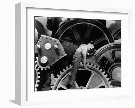 Charlie Chaplin. "The Masses" 1936, "Modern Times" Directed by Charles Chaplin-null-Framed Photographic Print