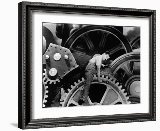 Charlie Chaplin. "The Masses" 1936, "Modern Times" Directed by Charles Chaplin-null-Framed Photographic Print