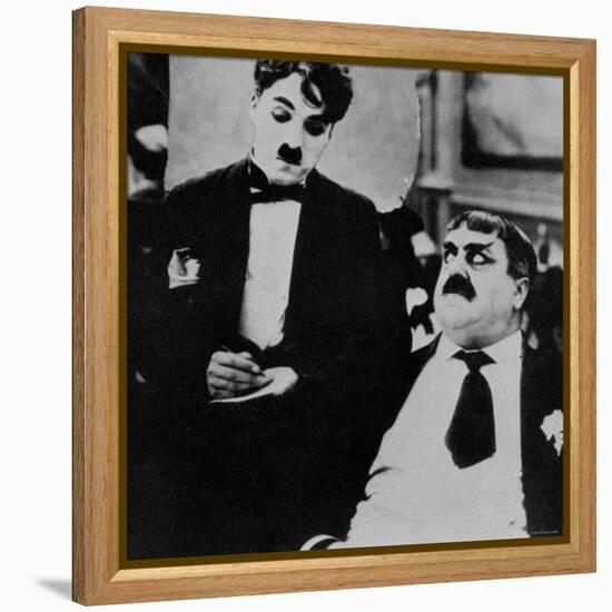 Charlie Chaplin with Eric Campbell in The Rink-null-Framed Premier Image Canvas