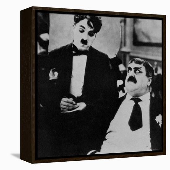 Charlie Chaplin with Eric Campbell in The Rink-null-Framed Premier Image Canvas