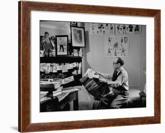 Charlie Goldman in His Room Reading the Newspaper--Framed Photographic Print