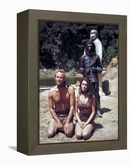 Charlton Heston; Linda Harrison. "Planet of the Apes" [1968], Directed by Franklin J. Schaffner.-null-Framed Premier Image Canvas