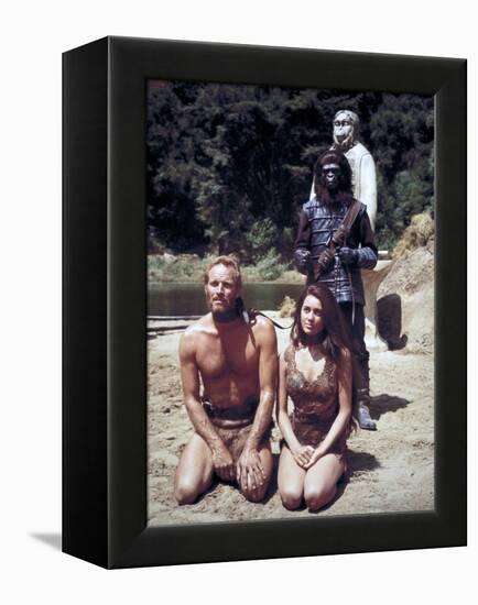 Charlton Heston; Linda Harrison. "Planet of the Apes" [1968], Directed by Franklin J. Schaffner.-null-Framed Premier Image Canvas