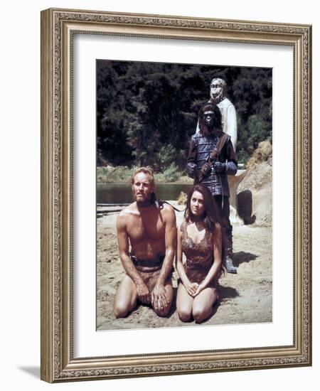 Charlton Heston; Linda Harrison. "Planet of the Apes" [1968], Directed by Franklin J. Schaffner.-null-Framed Photographic Print