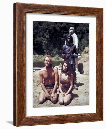 Charlton Heston; Linda Harrison. "Planet of the Apes" [1968], Directed by Franklin J. Schaffner.-null-Framed Photographic Print