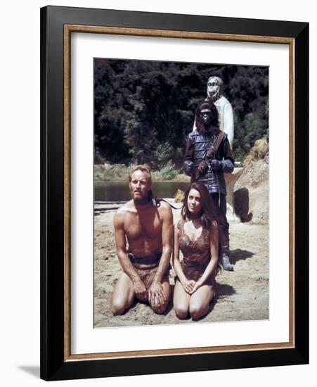 Charlton Heston; Linda Harrison. "Planet of the Apes" [1968], Directed by Franklin J. Schaffner.-null-Framed Photographic Print