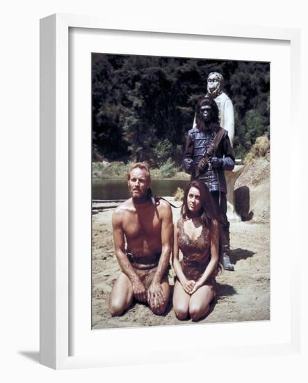 Charlton Heston; Linda Harrison. "Planet of the Apes" [1968], Directed by Franklin J. Schaffner.-null-Framed Photographic Print