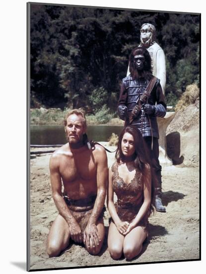 Charlton Heston; Linda Harrison. "Planet of the Apes" [1968], Directed by Franklin J. Schaffner.-null-Mounted Photographic Print