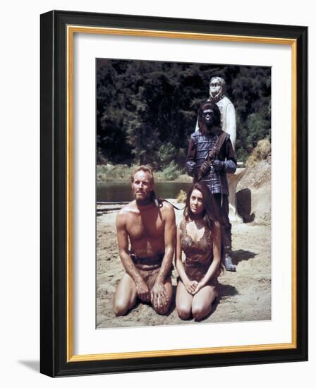 Charlton Heston; Linda Harrison. "Planet of the Apes" [1968], Directed by Franklin J. Schaffner.-null-Framed Photographic Print