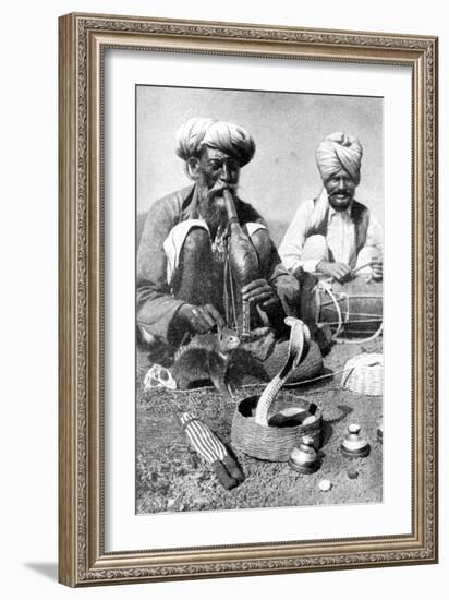 Charming the Venom from a Cobra; a Snake Charmer with a Mongoose, India, 1922-JH Reverend Powell-Framed Giclee Print