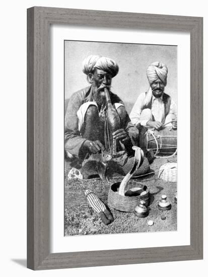 Charming the Venom from a Cobra; a Snake Charmer with a Mongoose, India, 1922-JH Reverend Powell-Framed Giclee Print