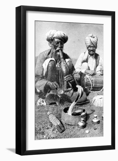 Charming the Venom from a Cobra; a Snake Charmer with a Mongoose, India, 1922-JH Reverend Powell-Framed Giclee Print