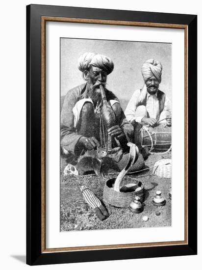 Charming the Venom from a Cobra; a Snake Charmer with a Mongoose, India, 1922-JH Reverend Powell-Framed Giclee Print