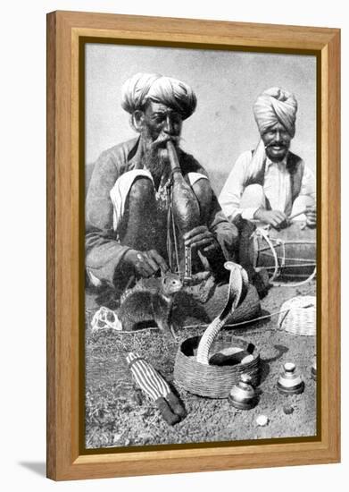 Charming the Venom from a Cobra; a Snake Charmer with a Mongoose, India, 1922-JH Reverend Powell-Framed Premier Image Canvas