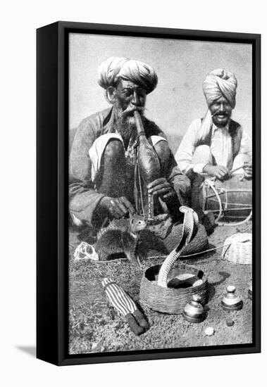 Charming the Venom from a Cobra; a Snake Charmer with a Mongoose, India, 1922-JH Reverend Powell-Framed Premier Image Canvas