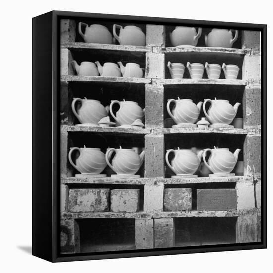 Cheap Chinaware Saucers, Cups, Teapots, Etc Standing on Racks in Pottery of the Hall China Co-Walker Evans-Framed Premier Image Canvas