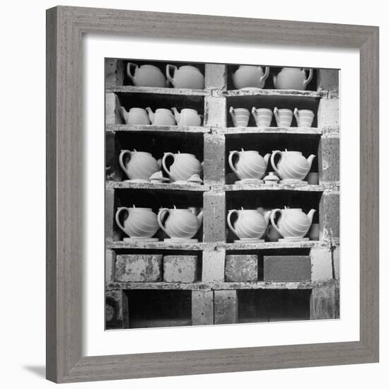 Cheap Chinaware Saucers, Cups, Teapots, Etc Standing on Racks in Pottery of the Hall China Co-Walker Evans-Framed Photographic Print