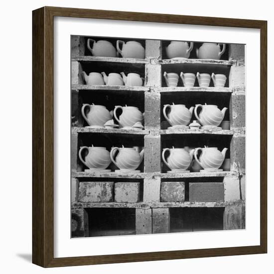 Cheap Chinaware Saucers, Cups, Teapots, Etc Standing on Racks in Pottery of the Hall China Co-Walker Evans-Framed Photographic Print