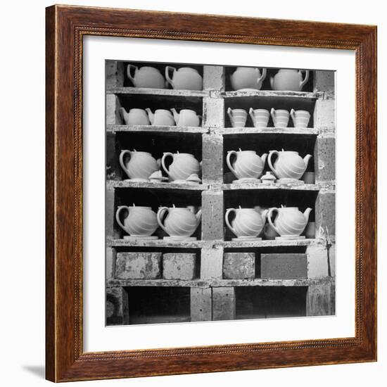 Cheap Chinaware Saucers, Cups, Teapots, Etc Standing on Racks in Pottery of the Hall China Co-Walker Evans-Framed Photographic Print