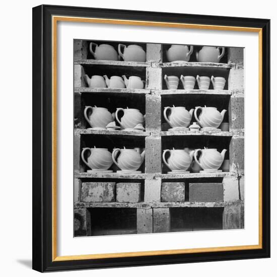 Cheap Chinaware Saucers, Cups, Teapots, Etc Standing on Racks in Pottery of the Hall China Co-Walker Evans-Framed Photographic Print