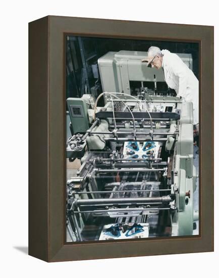 Checking a Printing Machine-Heinz Zinram-Framed Premier Image Canvas