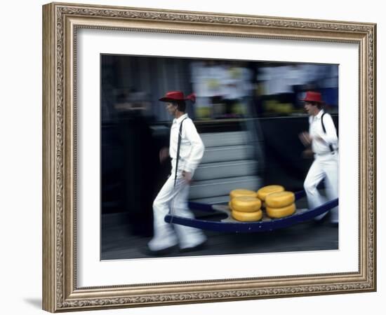 Cheese Carriers in Alkmaar, Holland-Michael DeFreitas-Framed Photographic Print