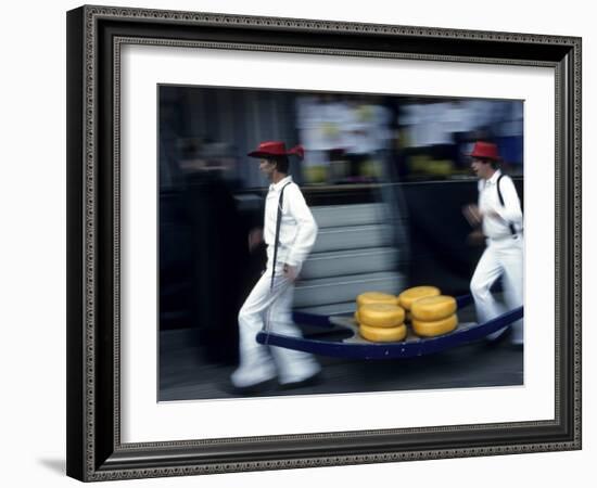 Cheese Carriers in Alkmaar, Holland-Michael DeFreitas-Framed Photographic Print