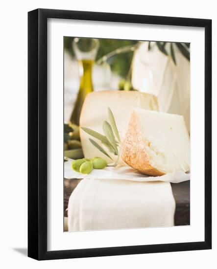 Cheese, Green Olives and Olive Oil on Table Out of Doors-null-Framed Photographic Print