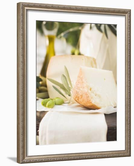 Cheese, Green Olives and Olive Oil on Table Out of Doors-null-Framed Photographic Print