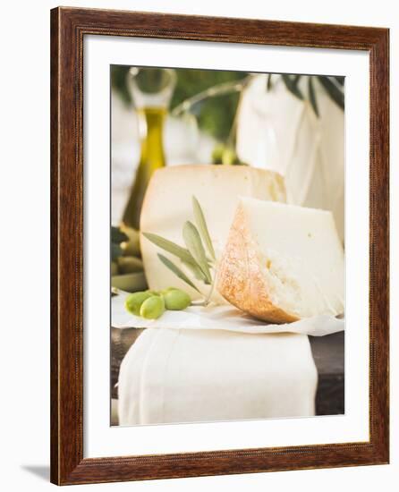 Cheese, Green Olives and Olive Oil on Table Out of Doors-null-Framed Photographic Print