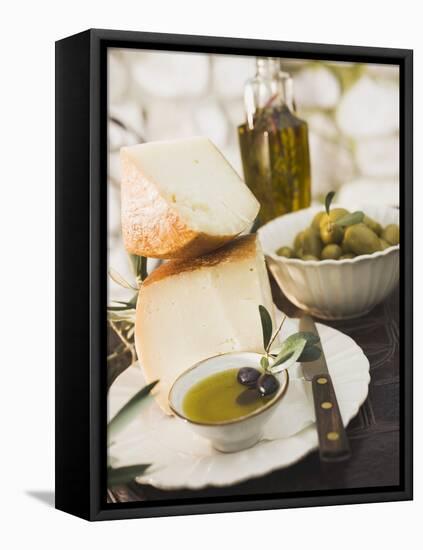 Cheese, Olives and Olive Oil on Table Out of Doors-null-Framed Premier Image Canvas