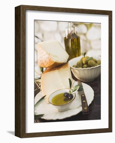 Cheese, Olives and Olive Oil on Table Out of Doors-null-Framed Photographic Print