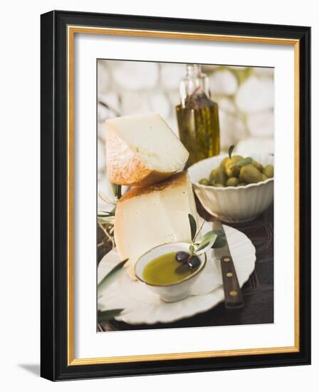 Cheese, Olives and Olive Oil on Table Out of Doors-null-Framed Photographic Print