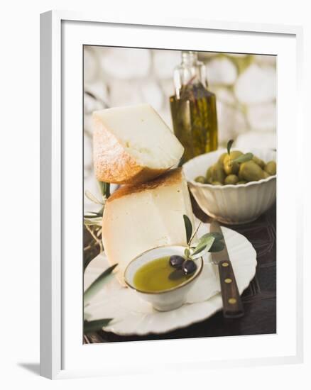 Cheese, Olives and Olive Oil on Table Out of Doors-null-Framed Photographic Print