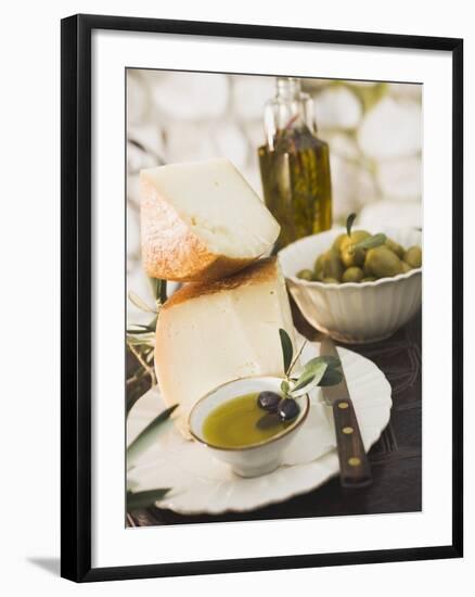 Cheese, Olives and Olive Oil on Table Out of Doors-null-Framed Photographic Print