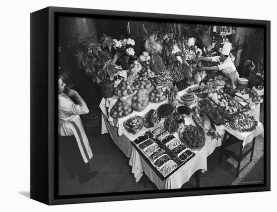 Chef Domenico Giving Final Touch to Magnificent Display of Food on Table at Passeto Restaurant-Alfred Eisenstaedt-Framed Premier Image Canvas