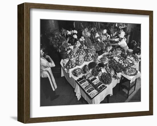 Chef Domenico Giving Final Touch to Magnificent Display of Food on Table at Passeto Restaurant-Alfred Eisenstaedt-Framed Photographic Print