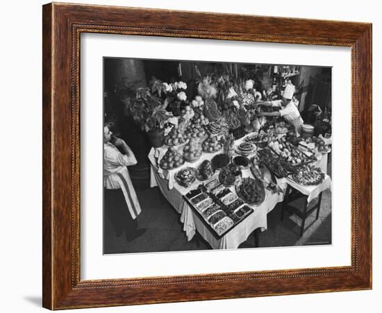 Chef Domenico Giving Final Touch to Magnificent Display of Food on Table at Passeto Restaurant-Alfred Eisenstaedt-Framed Photographic Print