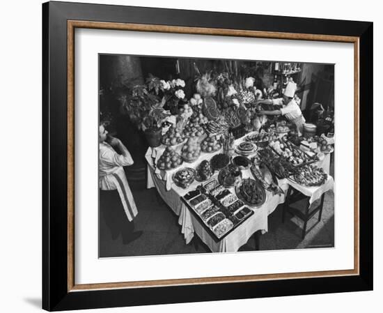 Chef Domenico Giving Final Touch to Magnificent Display of Food on Table at Passeto Restaurant-Alfred Eisenstaedt-Framed Photographic Print