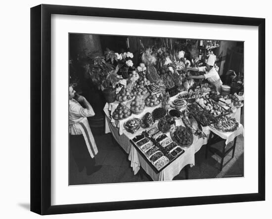 Chef Domenico Giving Final Touch to Magnificent Display of Food on Table at Passeto Restaurant-Alfred Eisenstaedt-Framed Photographic Print