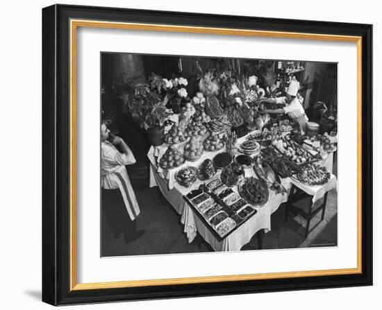 Chef Domenico Giving Final Touch to Magnificent Display of Food on Table at Passeto Restaurant-Alfred Eisenstaedt-Framed Photographic Print