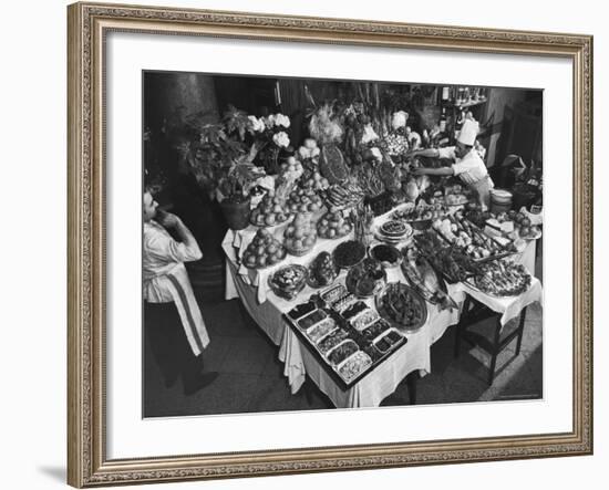 Chef Domenico Giving Final Touch to Magnificent Display of Food on Table at Passeto Restaurant-Alfred Eisenstaedt-Framed Photographic Print