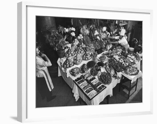 Chef Domenico Giving Final Touch to Magnificent Display of Food on Table at Passeto Restaurant-Alfred Eisenstaedt-Framed Photographic Print