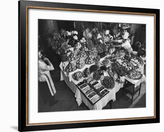 Chef Domenico Giving Final Touch to Magnificent Display of Food on Table at Passeto Restaurant-Alfred Eisenstaedt-Framed Photographic Print