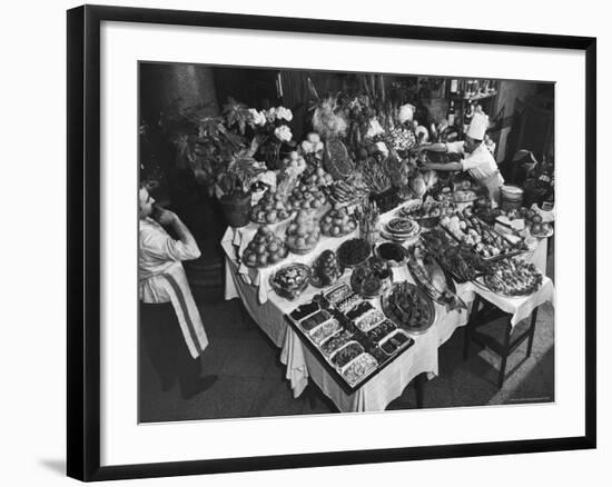 Chef Domenico Giving Final Touch to Magnificent Display of Food on Table at Passeto Restaurant-Alfred Eisenstaedt-Framed Photographic Print