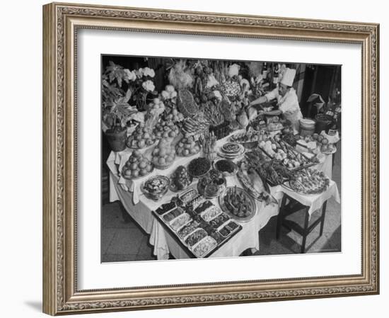 Chef Domenico Giving Final Touch to Magnificent Display of Food on Table at Passeto Restaurant-Alfred Eisenstaedt-Framed Photographic Print