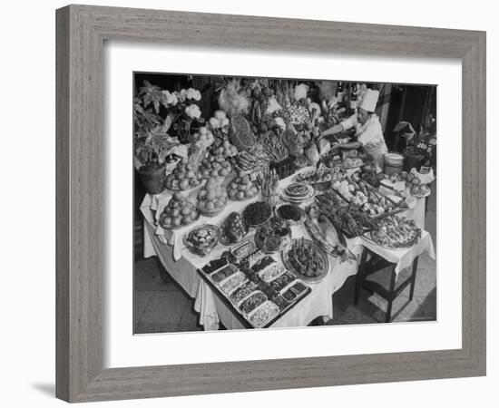 Chef Domenico Giving Final Touch to Magnificent Display of Food on Table at Passeto Restaurant-Alfred Eisenstaedt-Framed Photographic Print