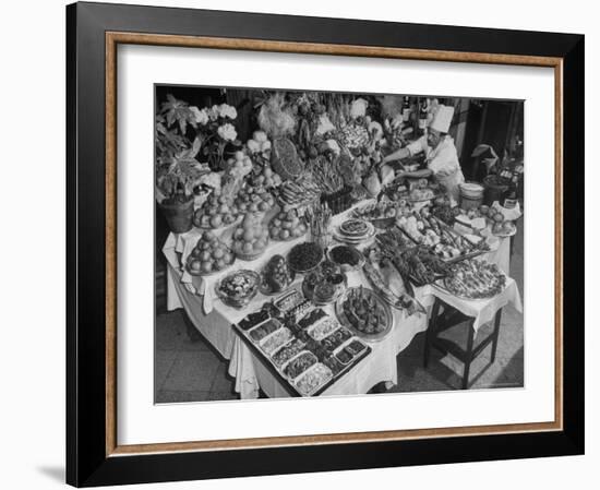 Chef Domenico Giving Final Touch to Magnificent Display of Food on Table at Passeto Restaurant-Alfred Eisenstaedt-Framed Photographic Print