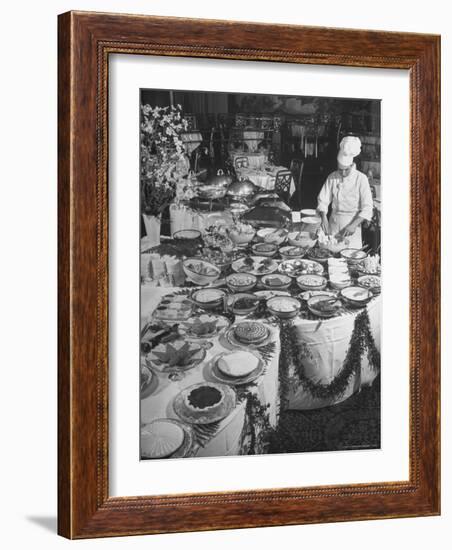 Chef Preparing Dish at Buffet Table in Dining Room of the Waldorf Astoria Hotel-Alfred Eisenstaedt-Framed Photographic Print